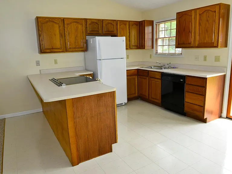 Kitchen with Door Access to Deck