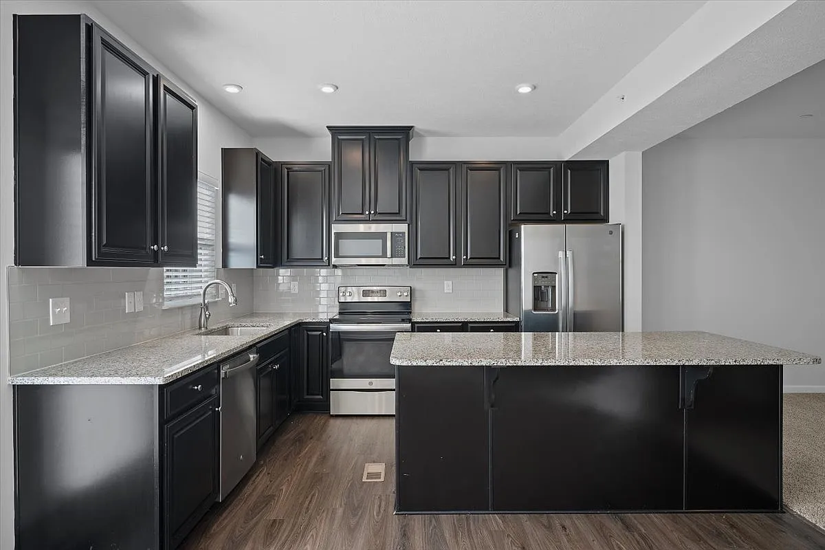 Plaza Townhomes — Photo 1