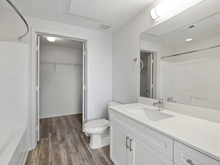Bathrooms with a conveniently placed walk-in closet.