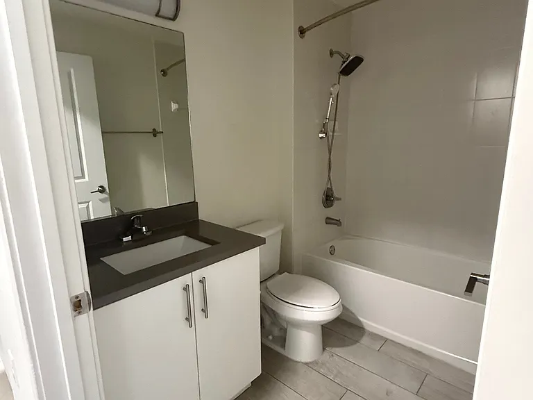 Guest Bathroom with granite countertops and updated finishes.
