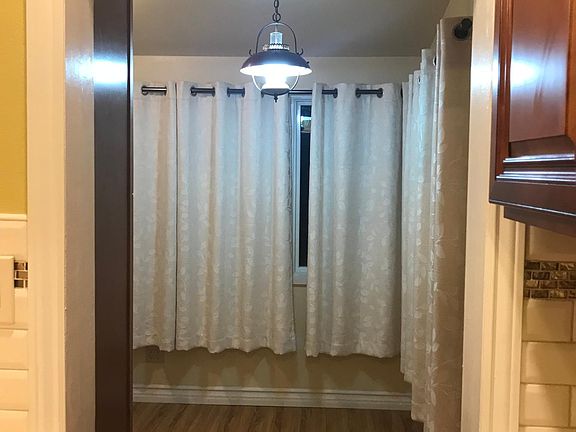 view from kitchen toward breakfast room entry