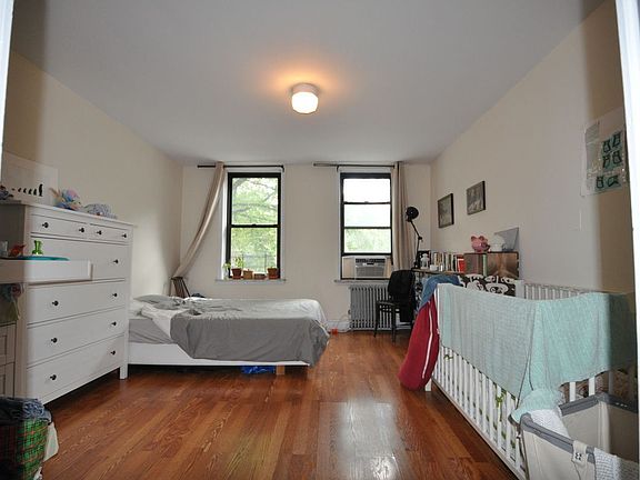 3rd image of 303 E 10th St APT 4