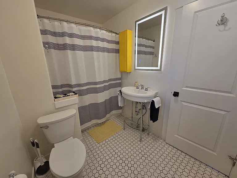 Hall bathroom shared by Bedrooms 1 and 2.