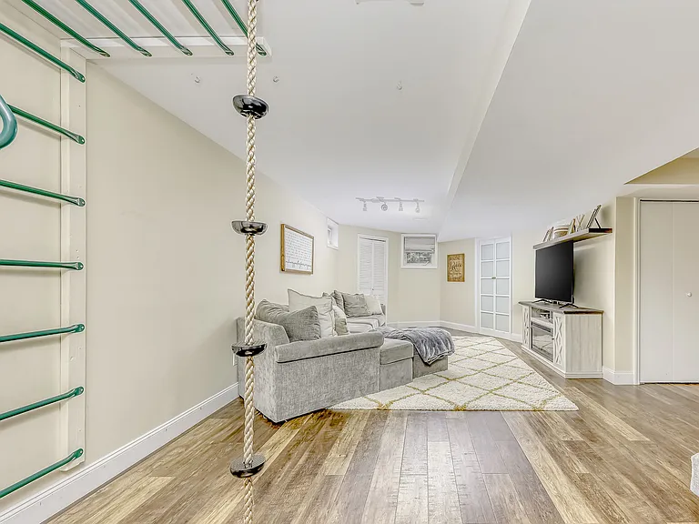 Basement living space with climbing rope