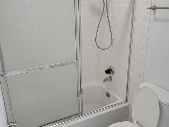 Hallway bathroom across from the bedroom.