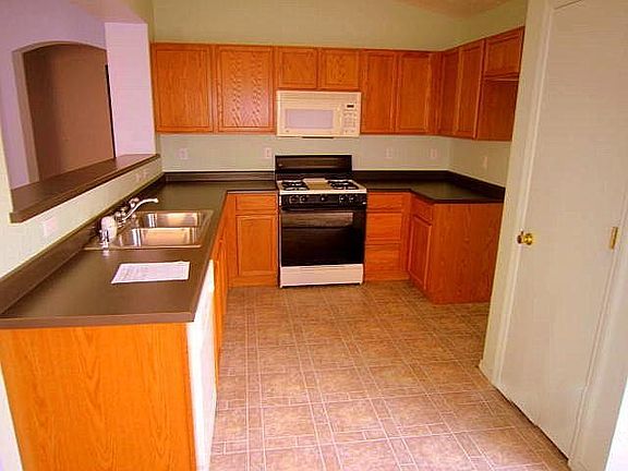 3rd image of 10409 Griffon Dr NW