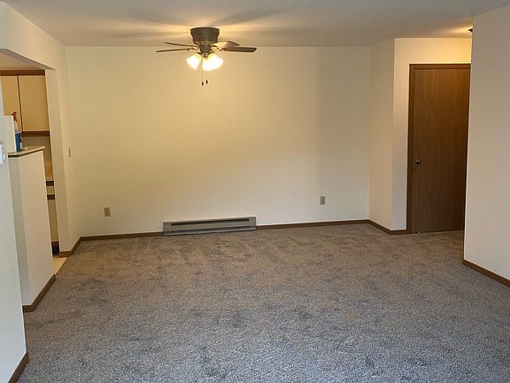Looking from the patio is the living room dining room.