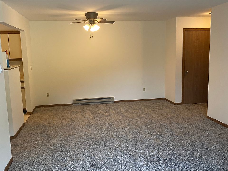 entry closet, dining room center and kitchen to left