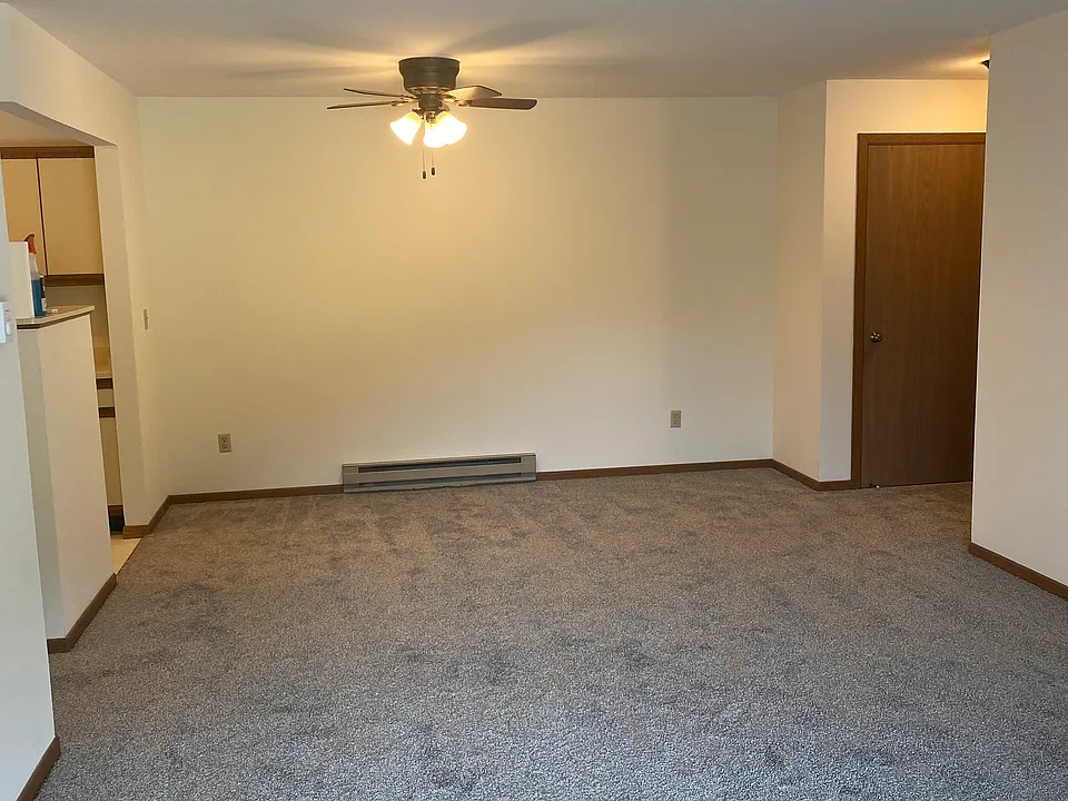 Looking from the patio is the living room dining room.