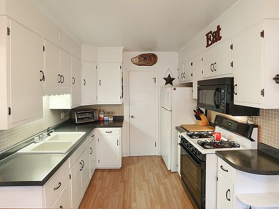Tons of cabinets in kitchen