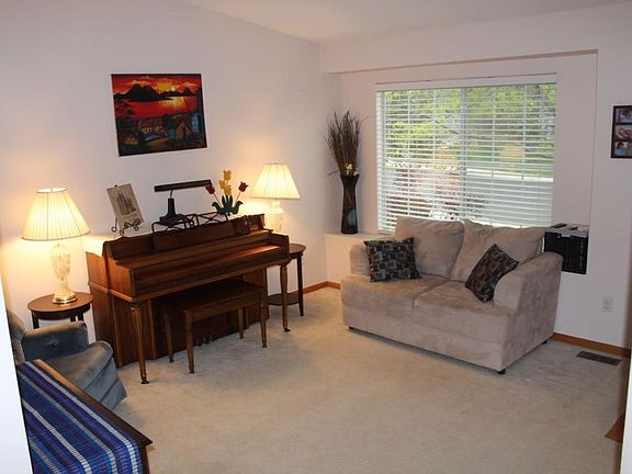 Cozy front room with coat closet.