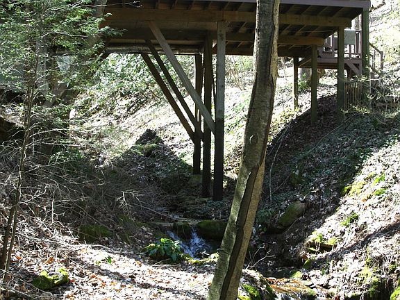 Sunroom and deck over creek