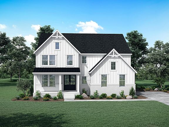 brick and board and batten house