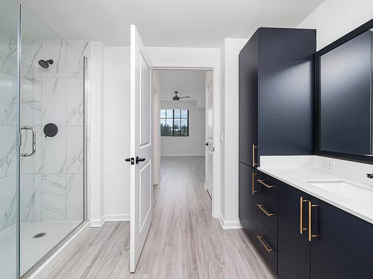 Spa-inspired bathrooms with double vanities and walk-in showers