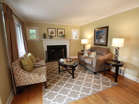 Living room with wood burning fire place