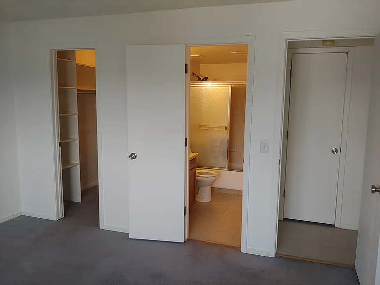 Closet on Left, Private Doorway Into Bathroom and Bedroom Entrance on Right