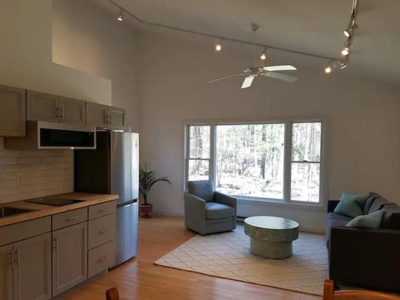 Brand new kitchen and living room. Comfortable, antique, and curated luxury furniture.