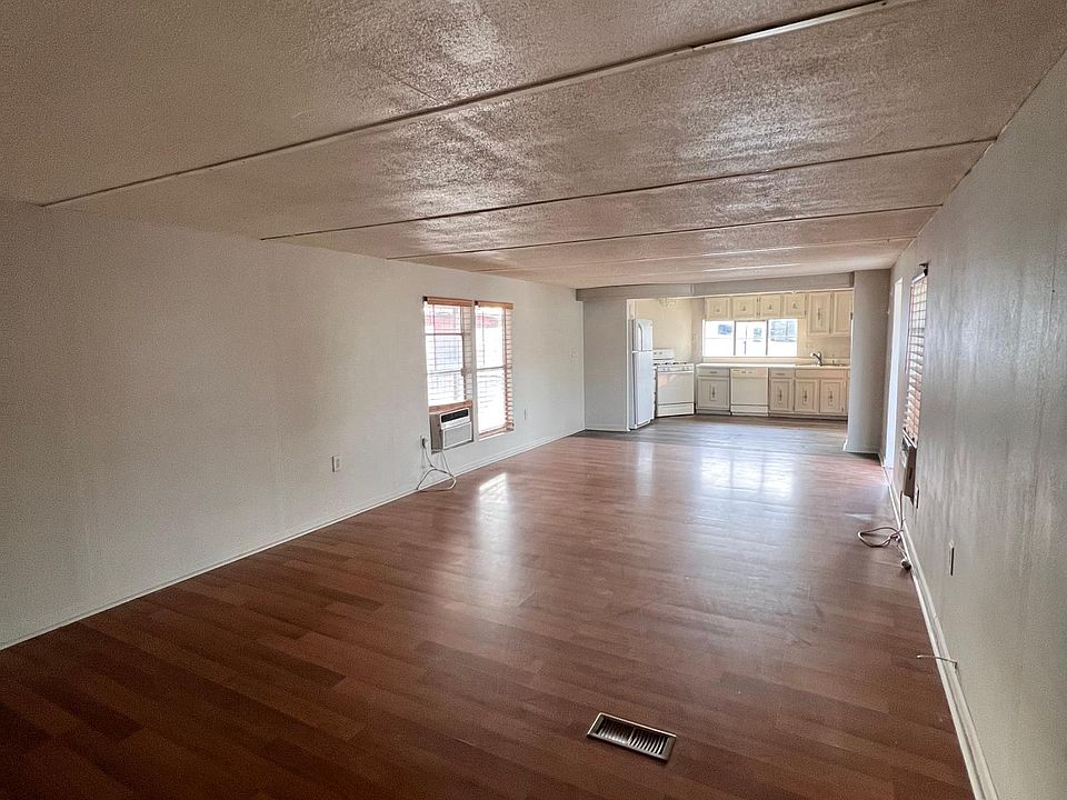 Living Room (facing kitchen, hallway behind)