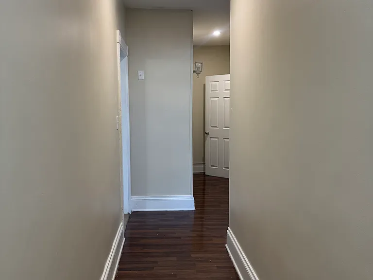 Long hallway leading to each bedroom