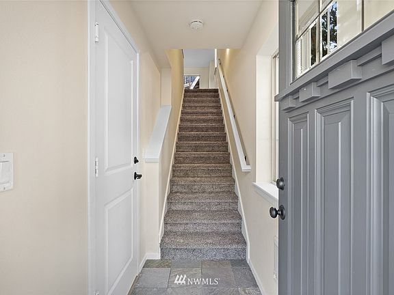 Slate entry is super practical. Man door to the garage is on the left.
