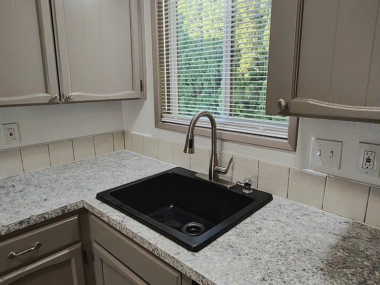 Large sink with new faucet
