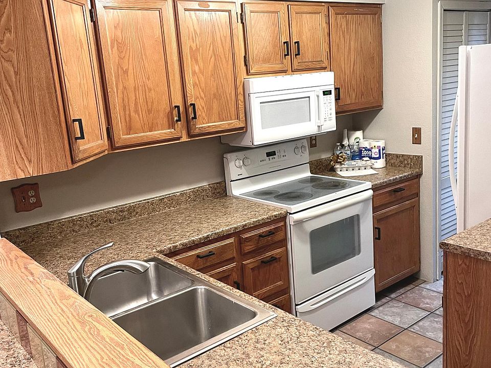 kitchen with 2 large pantry cabinets.