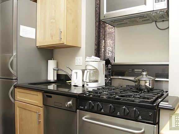 3rd image of 73 E 3rd St APT E2