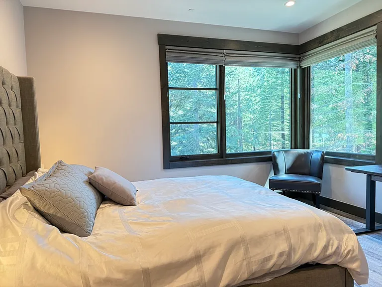 Huge windows to enjoy the winter and direct access to the outdoor deck and hot tub