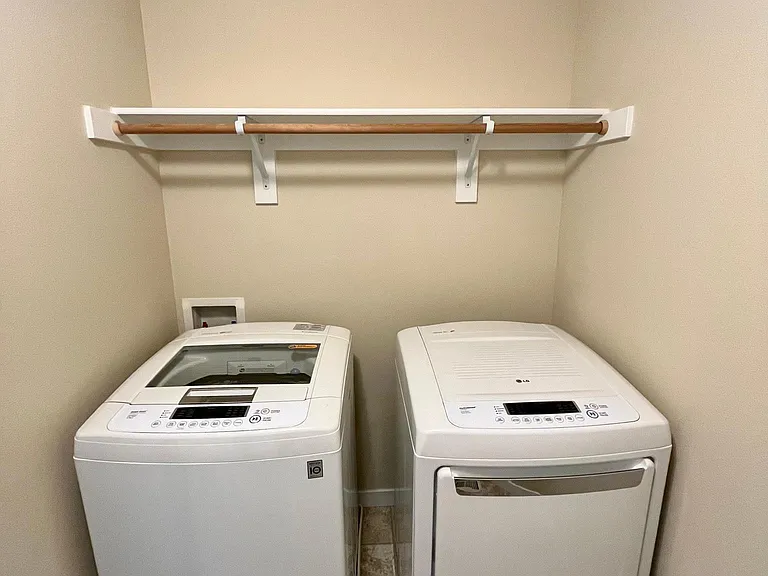 Laundry room with washer and dryer