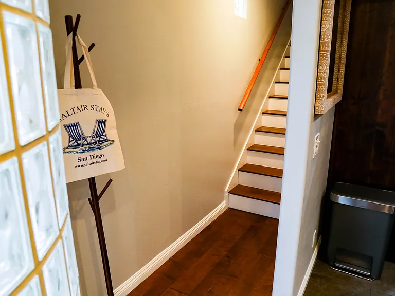 Staircase leading to all bedrooms on 2nd floor