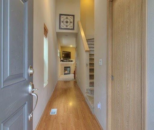 Entryway. There is a 0.5 bathroom to the right. Great utiliz