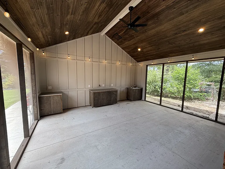 Screened Patio in the back yard off of the Family Room