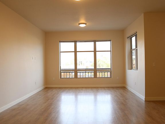10 ft ceilings and large dual-pane windows to enjoy natural light and the beautiful views of Sugarhouse.