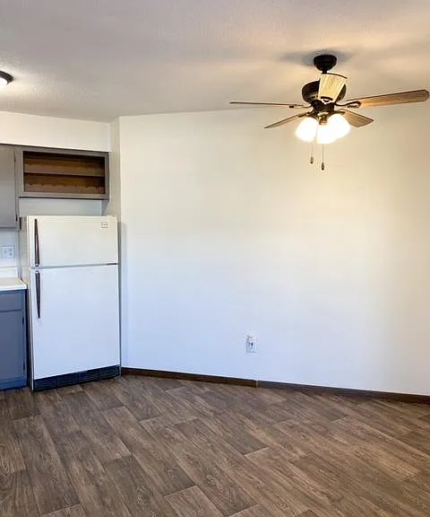 Eat in kitchen with new ceiling fan.