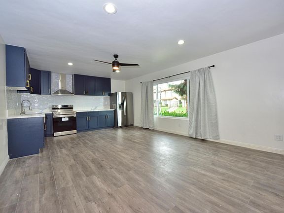 beautifully upgraded unit, new recessed lighting, new kitchen, SS appliances, and so much more