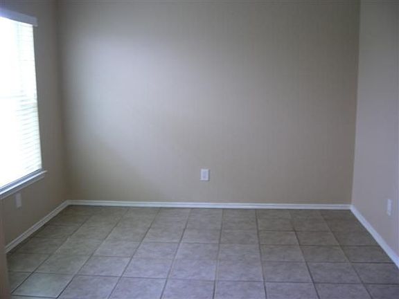 Dining space opens into kitchen