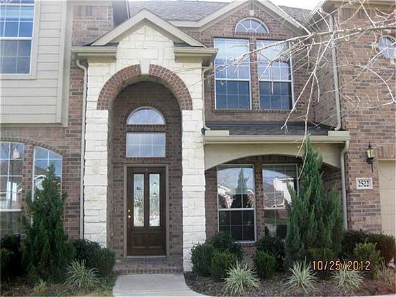 Front accented by stone.