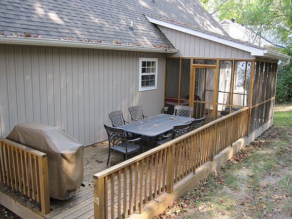 Nice Stained Desk with Picturesque Screened-in Porch 