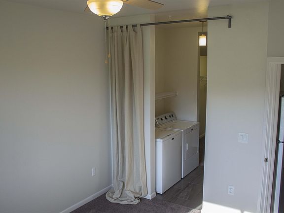 Bedroom leading to Washer and Dryer