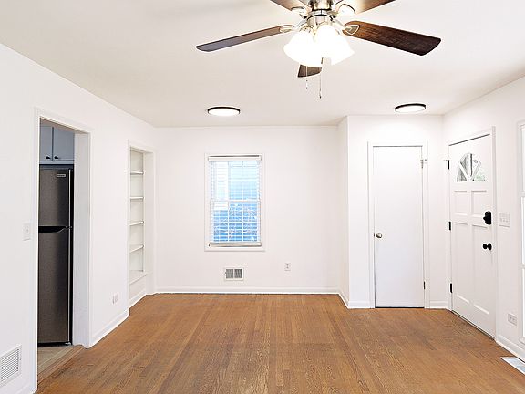 living room with coat closet