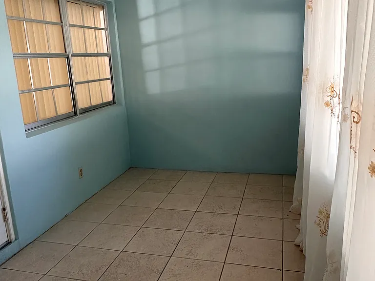Enclosed porch.