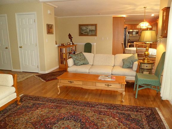 living room towards entrance hallway on left