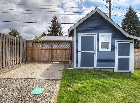 Parking available in your yard through gate. Fully updated shed
