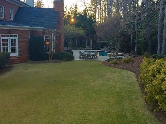 Large backyard adjacent pool