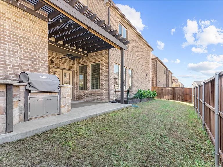 Side yard, privacy fence, garden beds