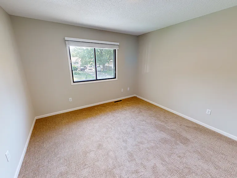 One of the two upstairs bedrooms