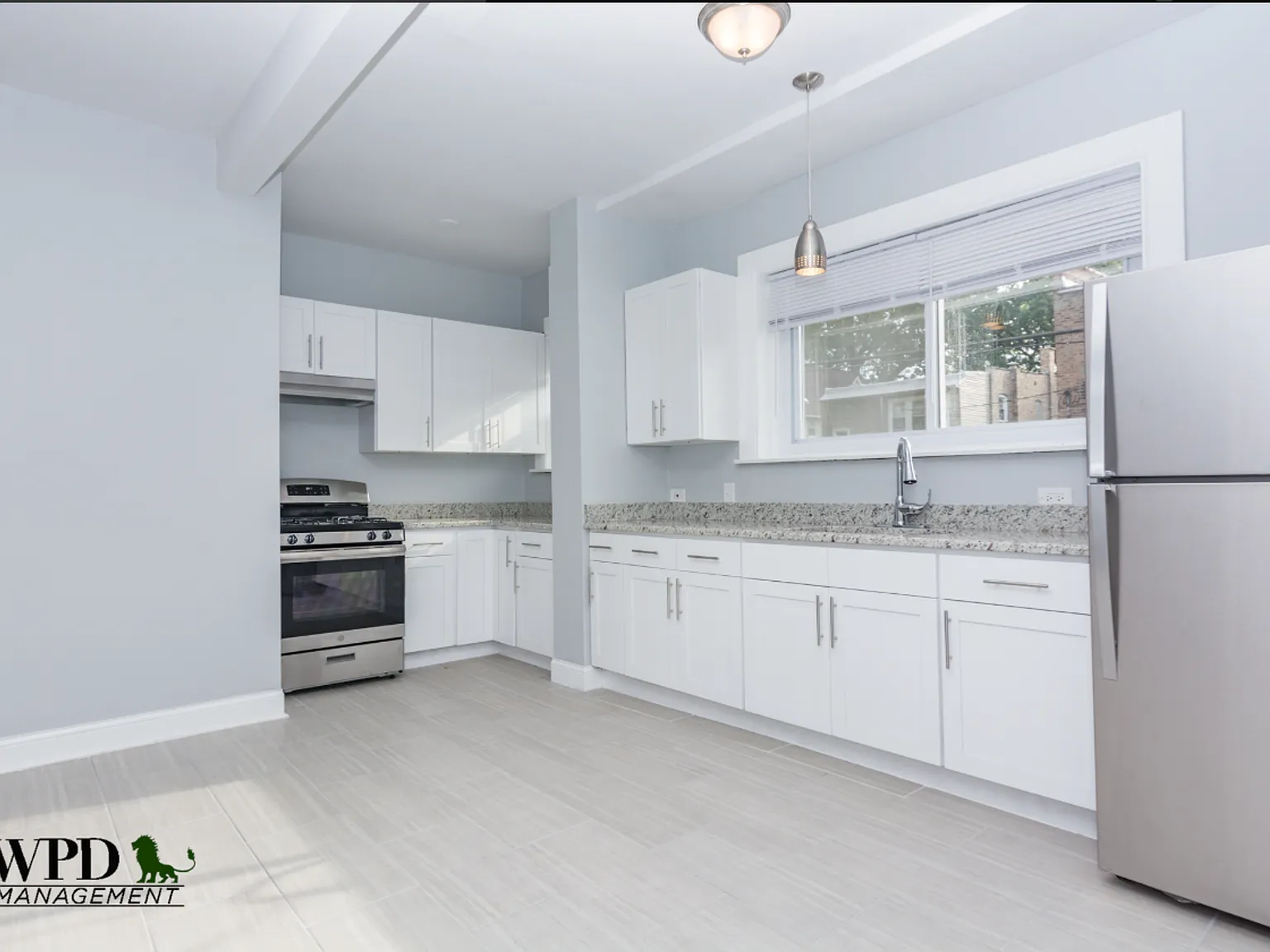 7639 S. Colfax Ave. — Photo 3