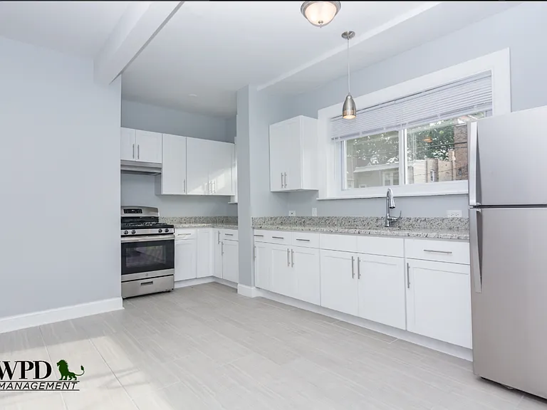 7639 S. Colfax Ave. — Photo 3