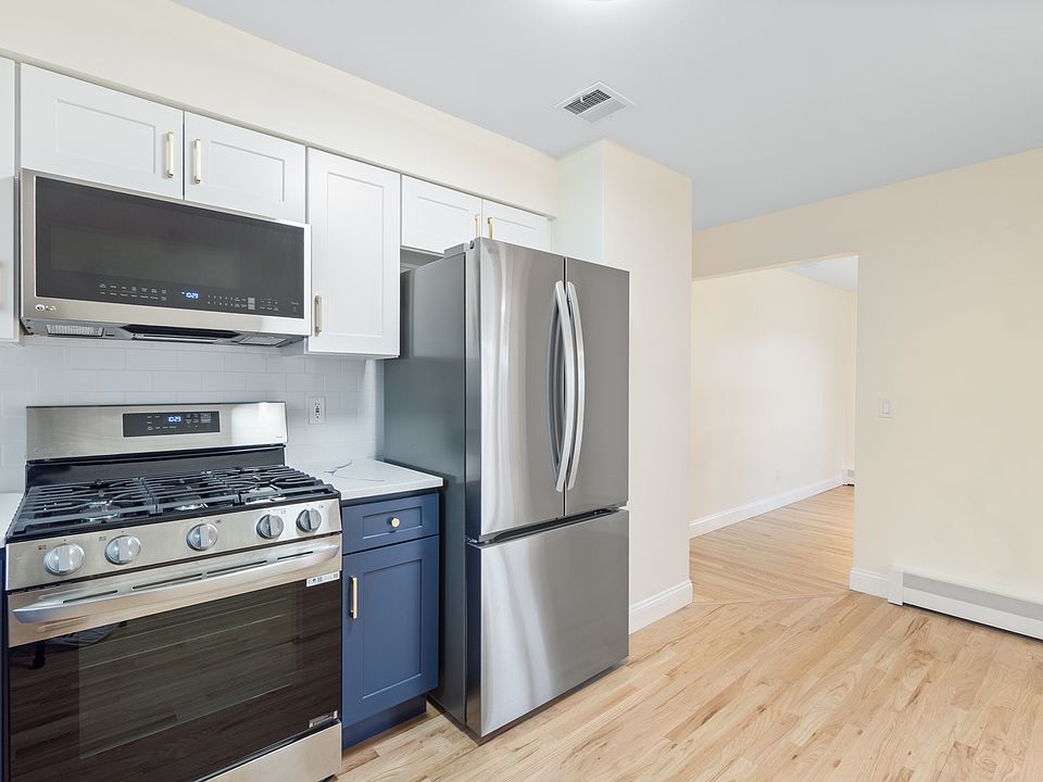 Renovated kitchen with view of dining room entrance