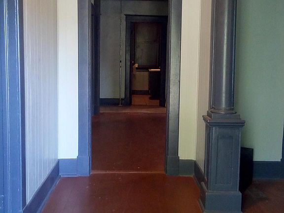 From the front door, dining, living area on right and 3 bedr